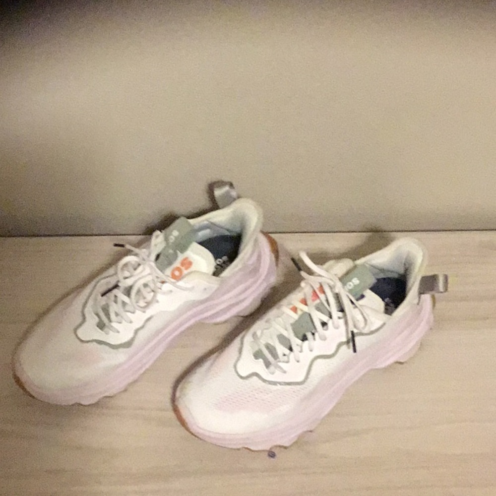 Sorel tennis shoe size 8.5 .White, light pink and sage green accents.